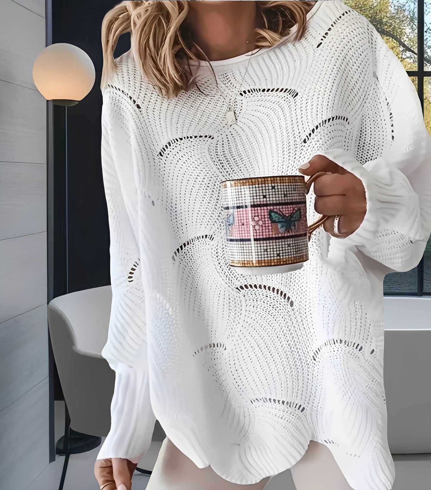 Kassandra - Pull féminin chic avec détails découpés