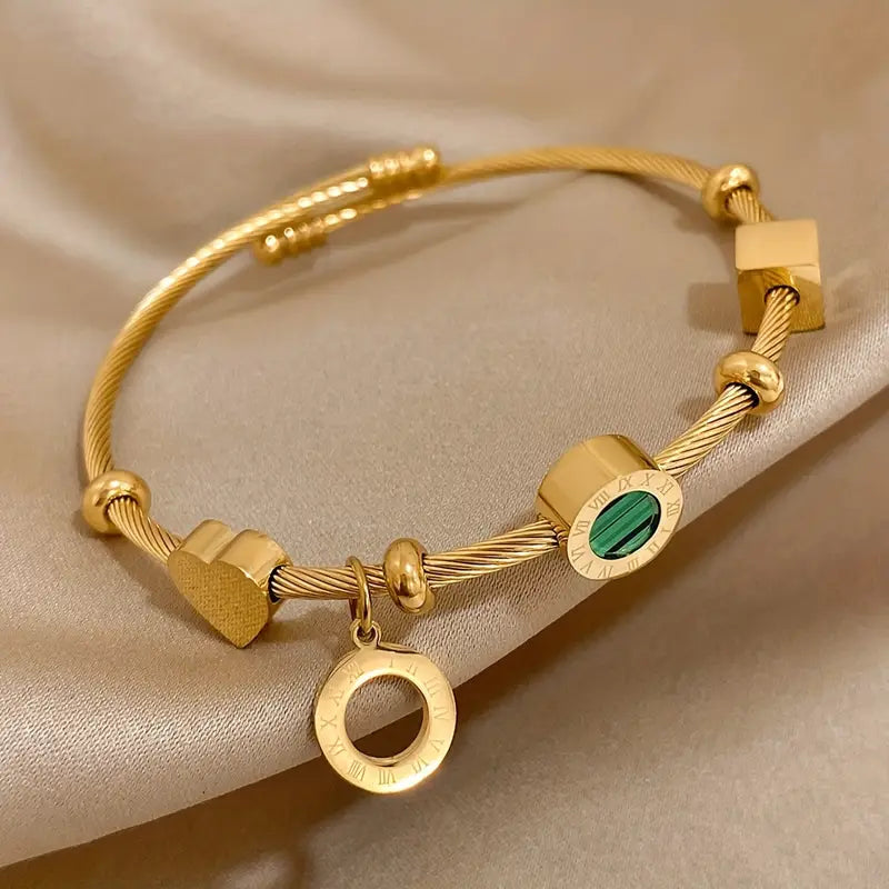Rhian – Bracelet doré de signature