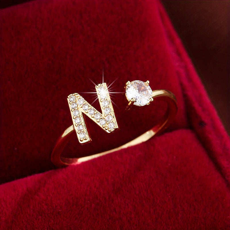 Nova – Bague ouverte moderne avec initiale et zircon