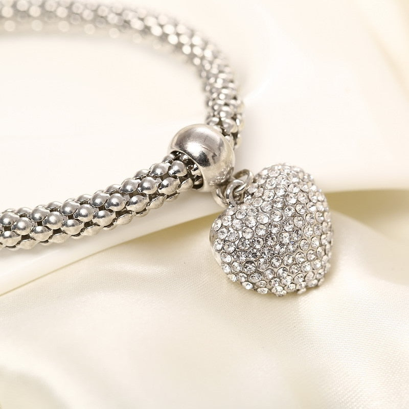 Aria – Bracelet en métal avec cœurs solides