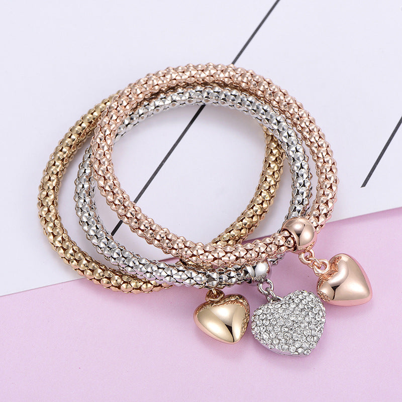Aria – Bracelet en métal avec cœurs solides