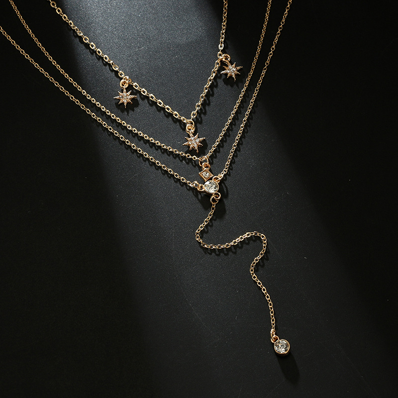 Collier à couches avec charms d'étoile en cristal boho
