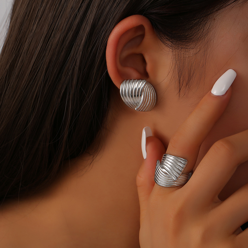 Sonia - Boucles d'oreilles en vagues dorées
