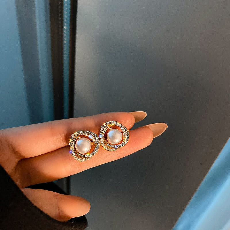 Aveline – Boucles d'oreilles en perles en forme de spirale