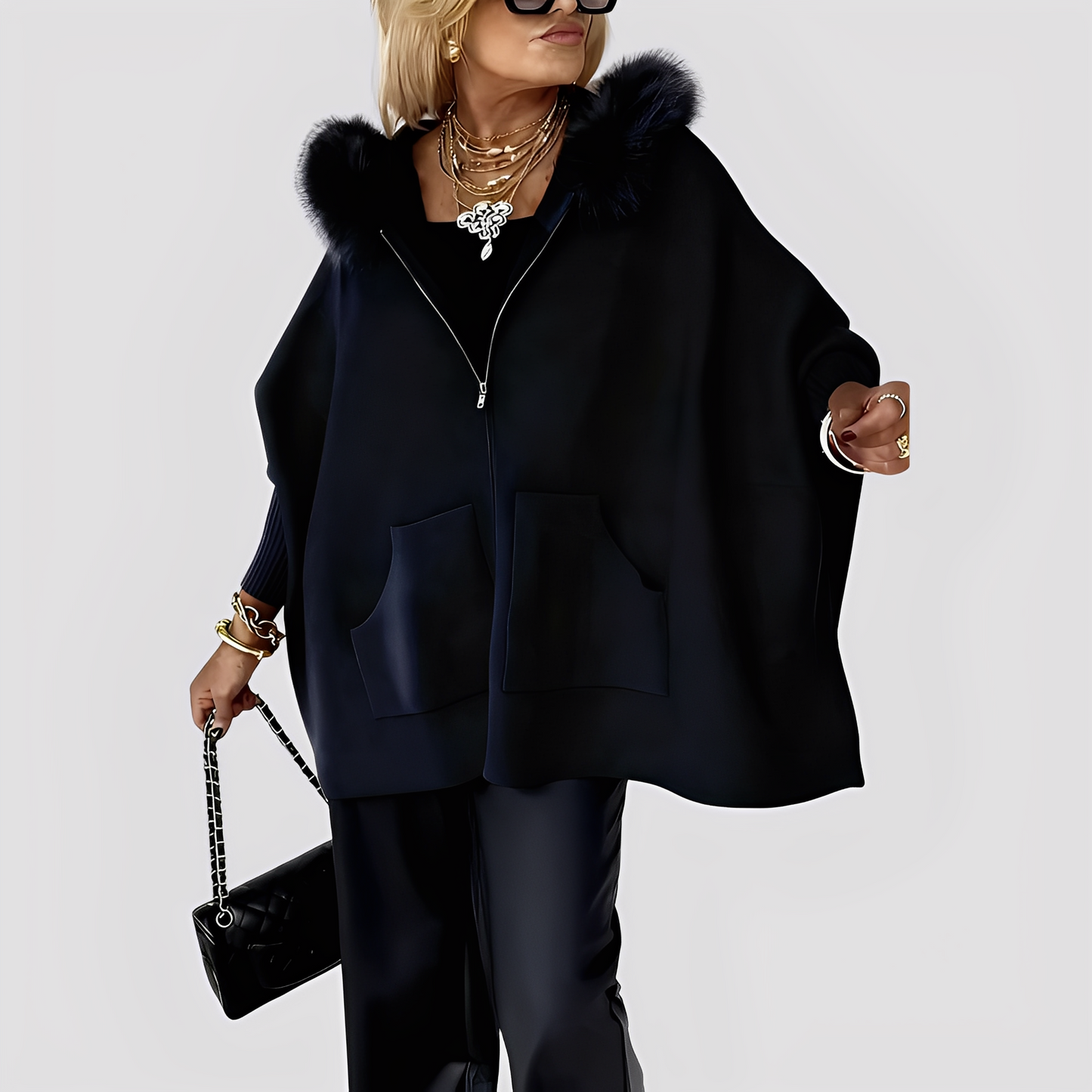 Elvena - Manteau moderne en fausse fourrure avec capuche pour femmes