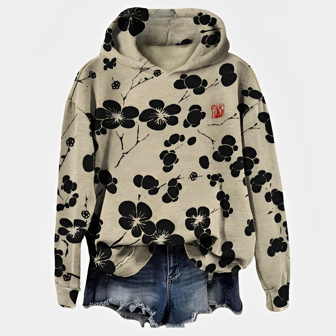 Emelyn - Un pull à capuche avec motif floral pour femmes