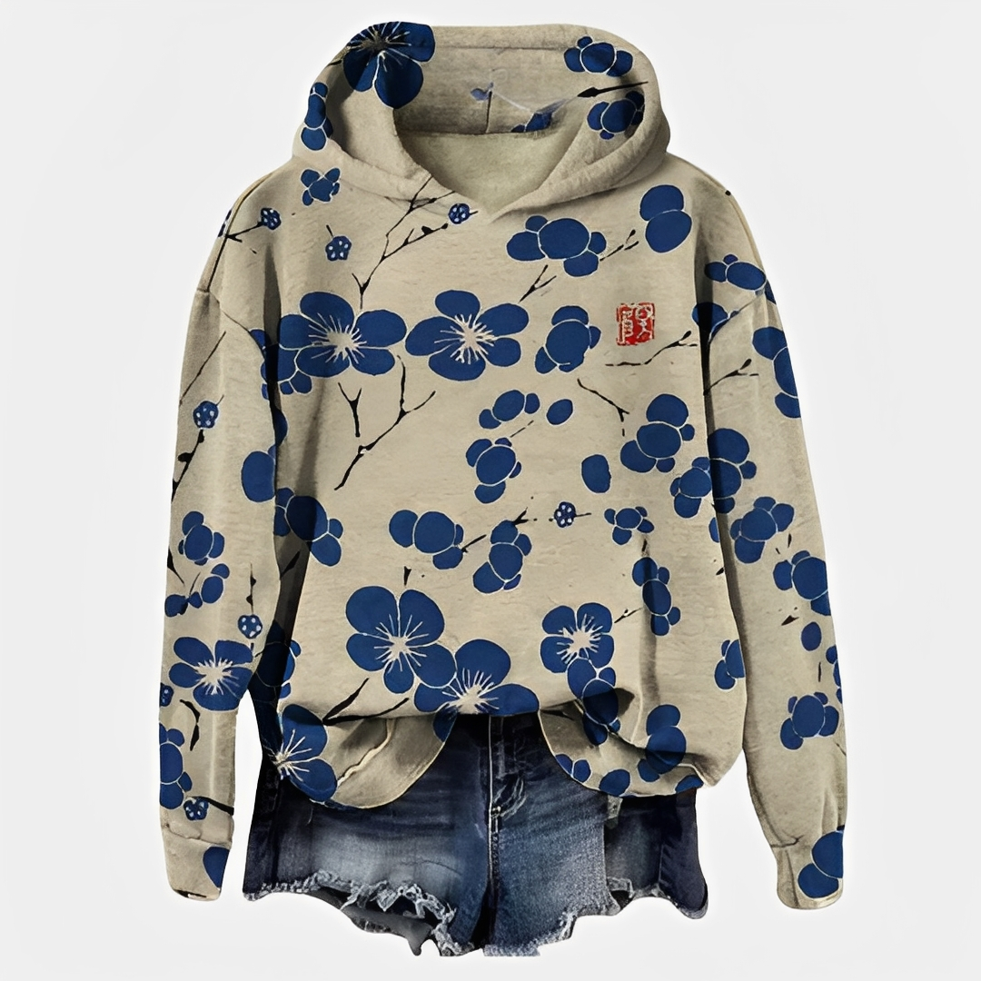 Emelyn - Un pull à capuche avec motif floral pour femmes