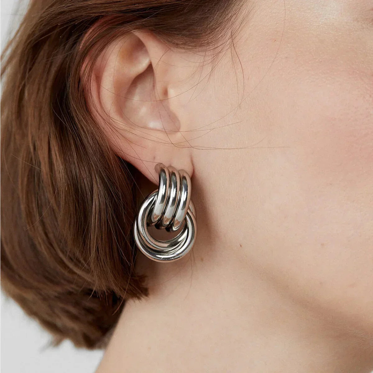 Nyra – Boucles d'oreilles géométriquement torsadées