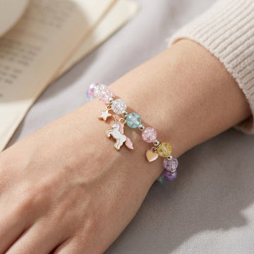Rêvé - Bracelet de perles avec pendentif de licorne