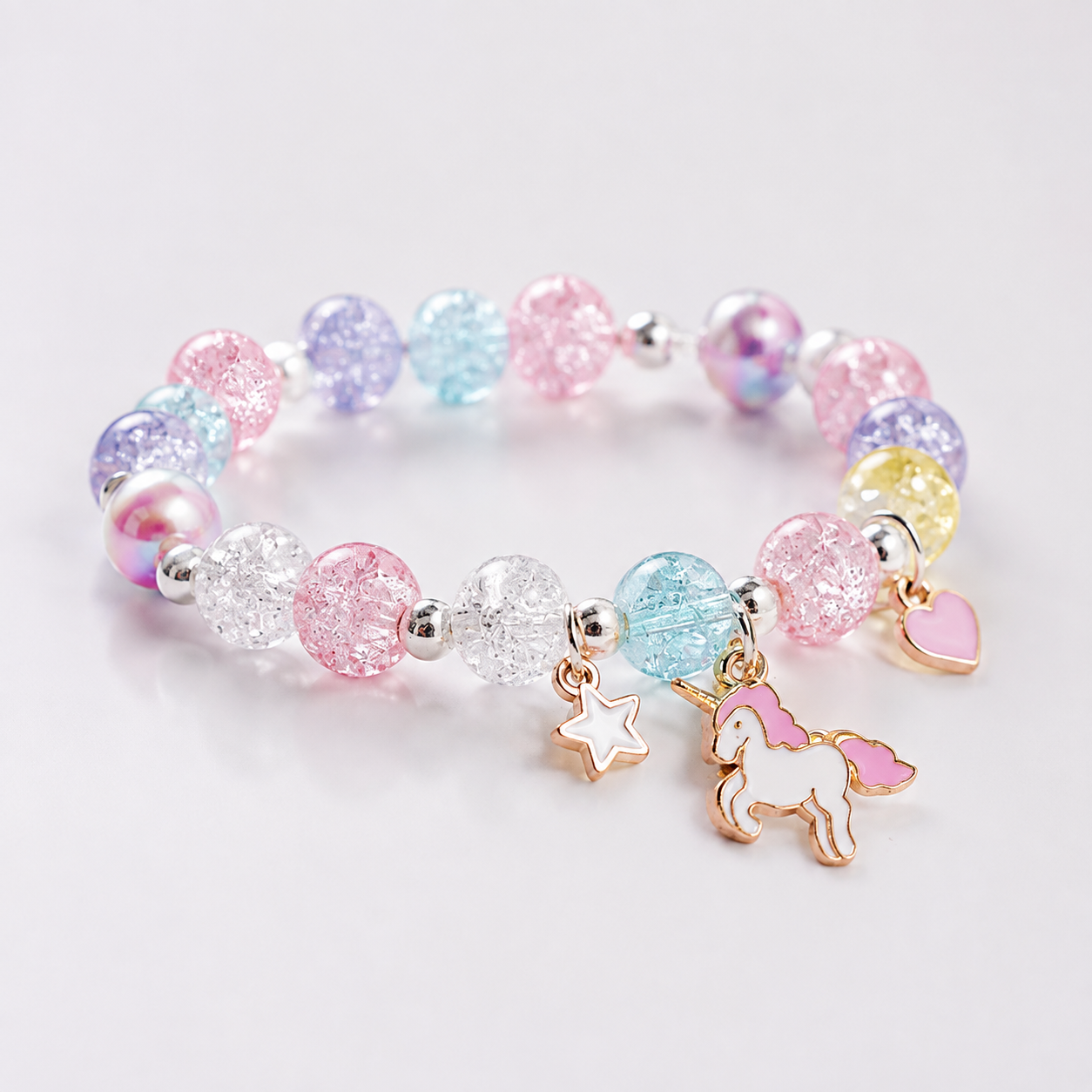 Rêvé - Bracelet de perles avec pendentif de licorne