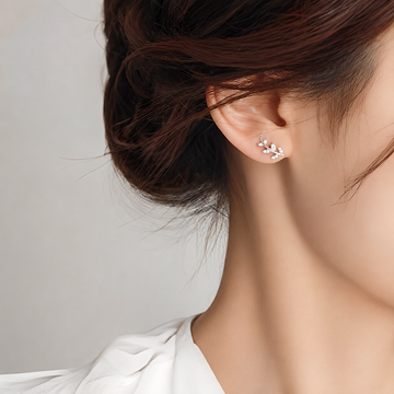 Liana – Boucles d'oreilles en feuilles brillantes