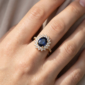 Delphine – Bague Chic dorée avec pierre bleue