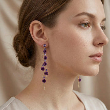 Floréa – Boucles d'oreilles dorées avec fleurs suspendues