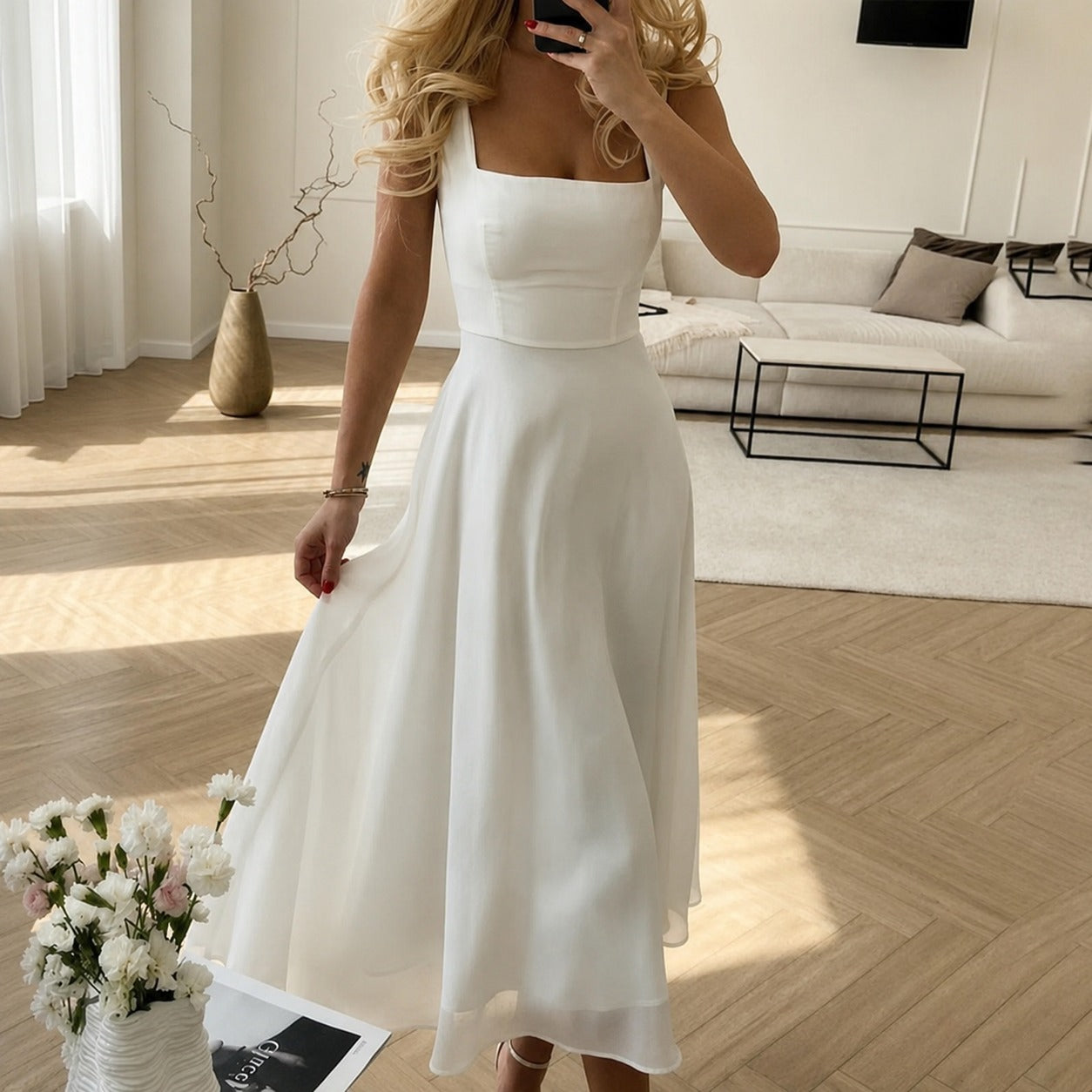 Eva - Robe chic sans manches