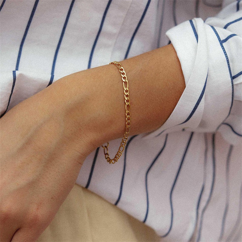 Saturn - Bracelet en chaîne dorée