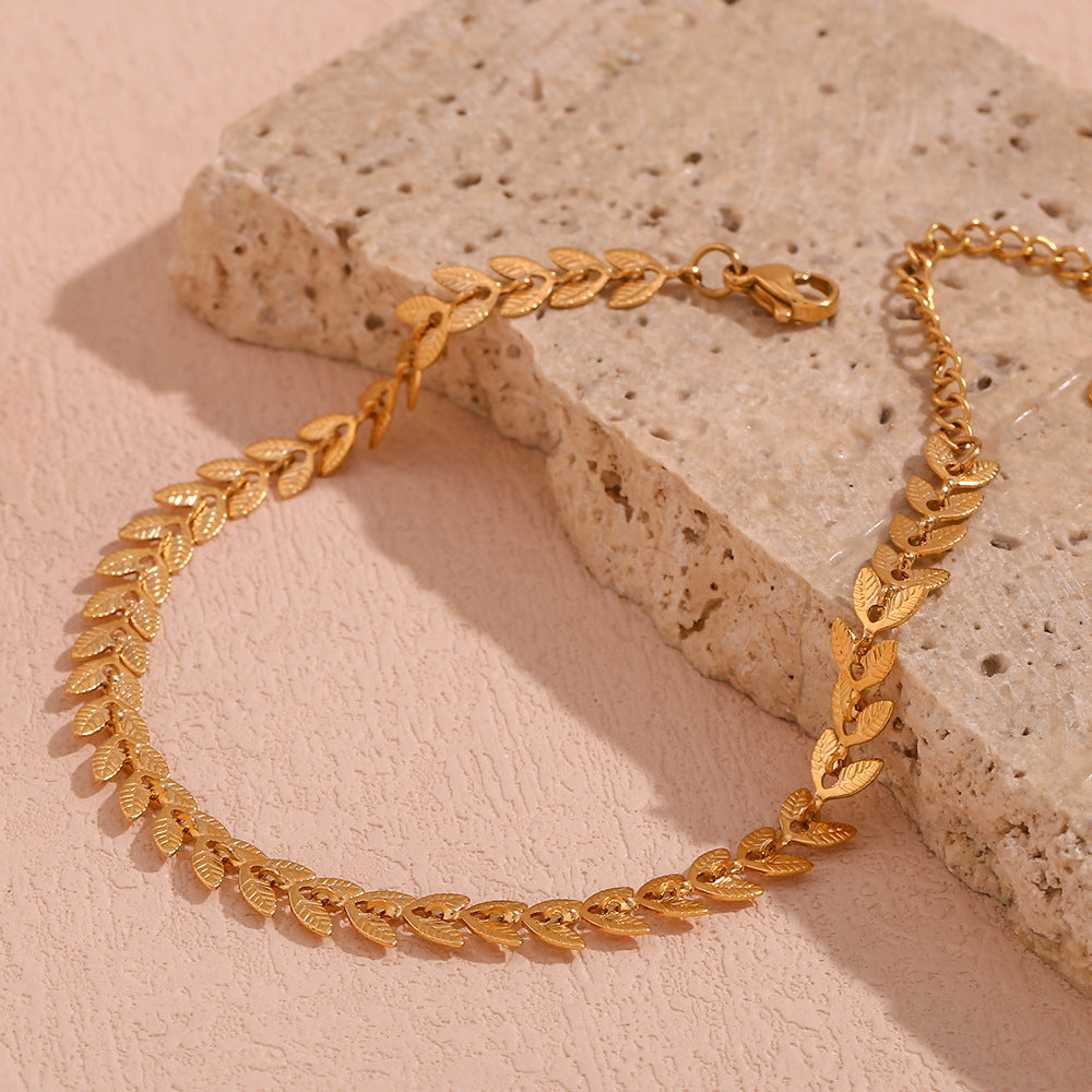 Delaida - Bracelet en or en forme de feuille