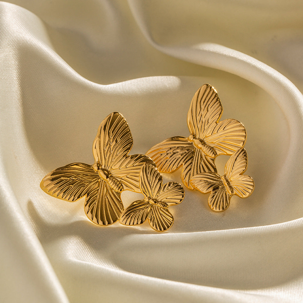 Mariah - Boucles d'oreilles en or en forme de papillon