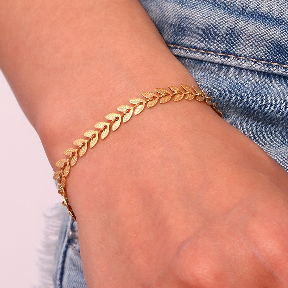Delaida - Bracelet en or en forme de feuille