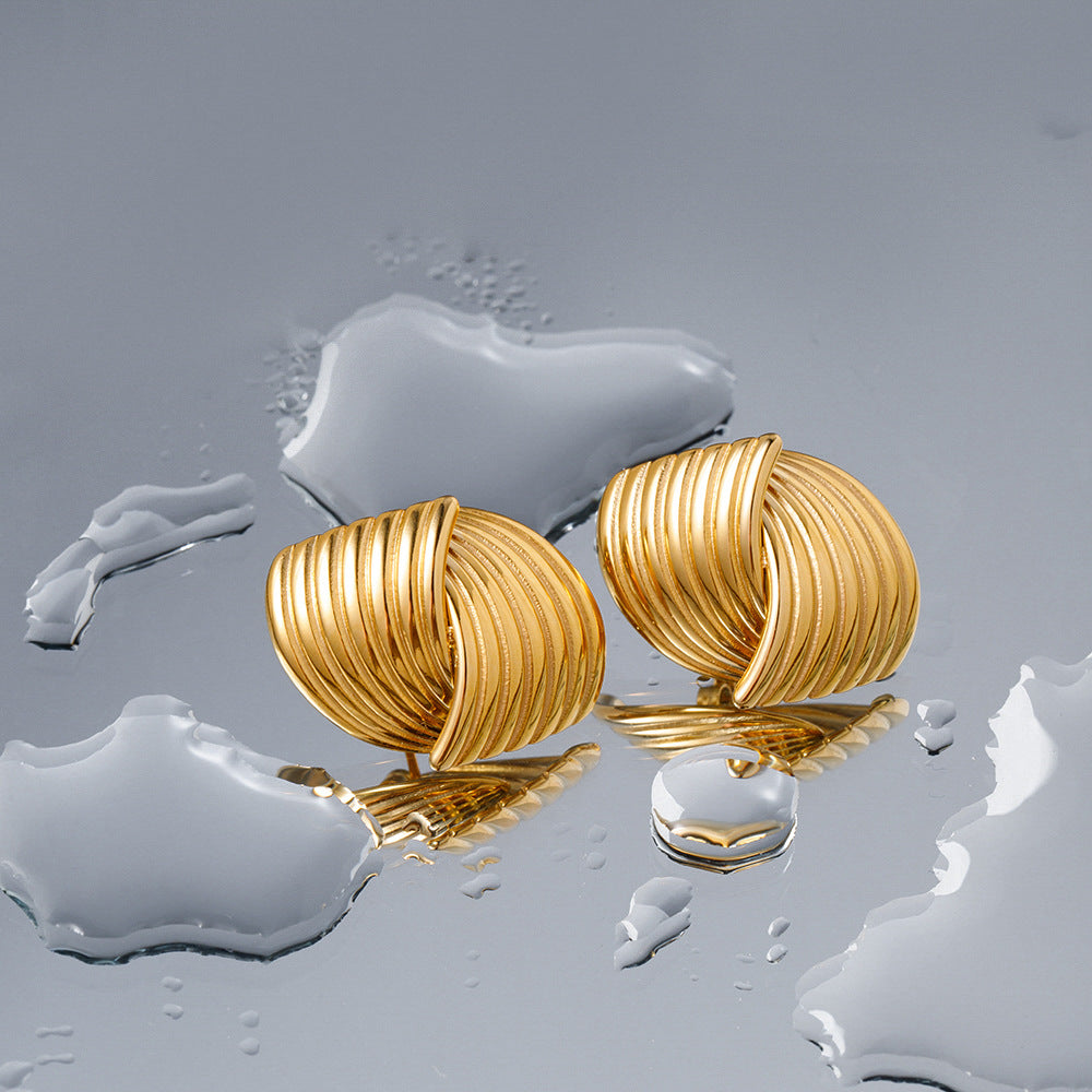 Sonia - Boucles d'oreilles en vagues dorées