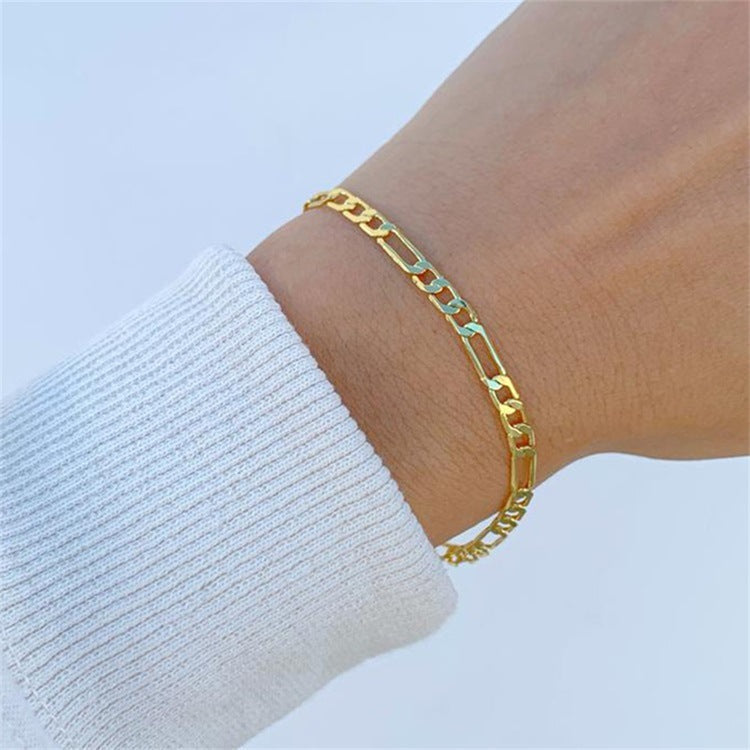 Saturn - Bracelet en chaîne dorée