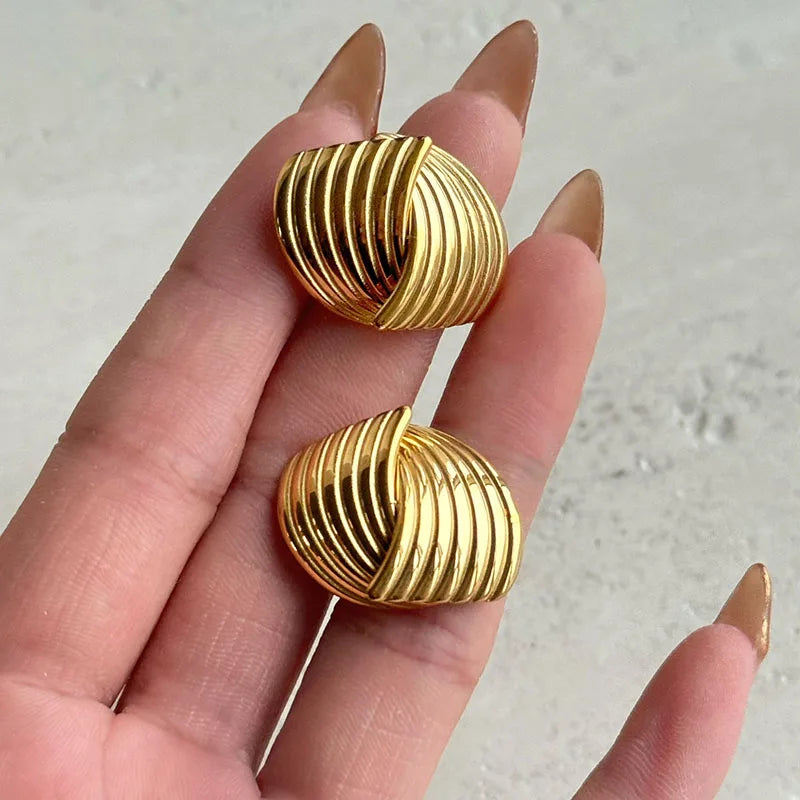Sonia - Boucles d'oreilles en vagues dorées