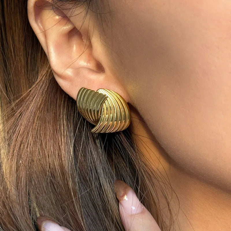 Sonia - Boucles d'oreilles en vagues dorées
