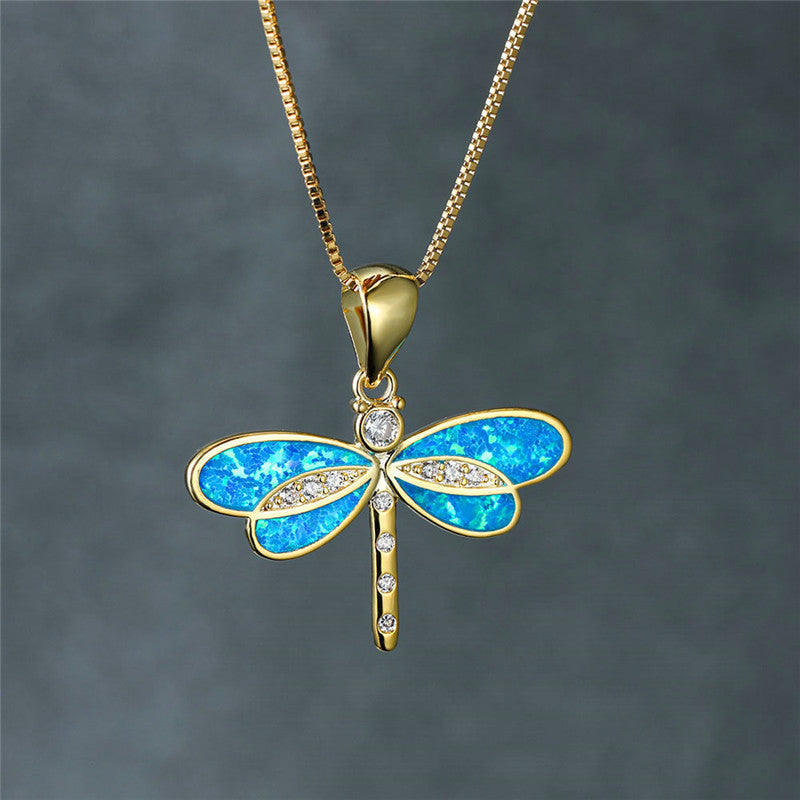 Maggie – Collier libellule dorée avec opale