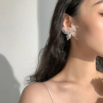 Jean – Boucles d'oreilles papillon en tressage léger