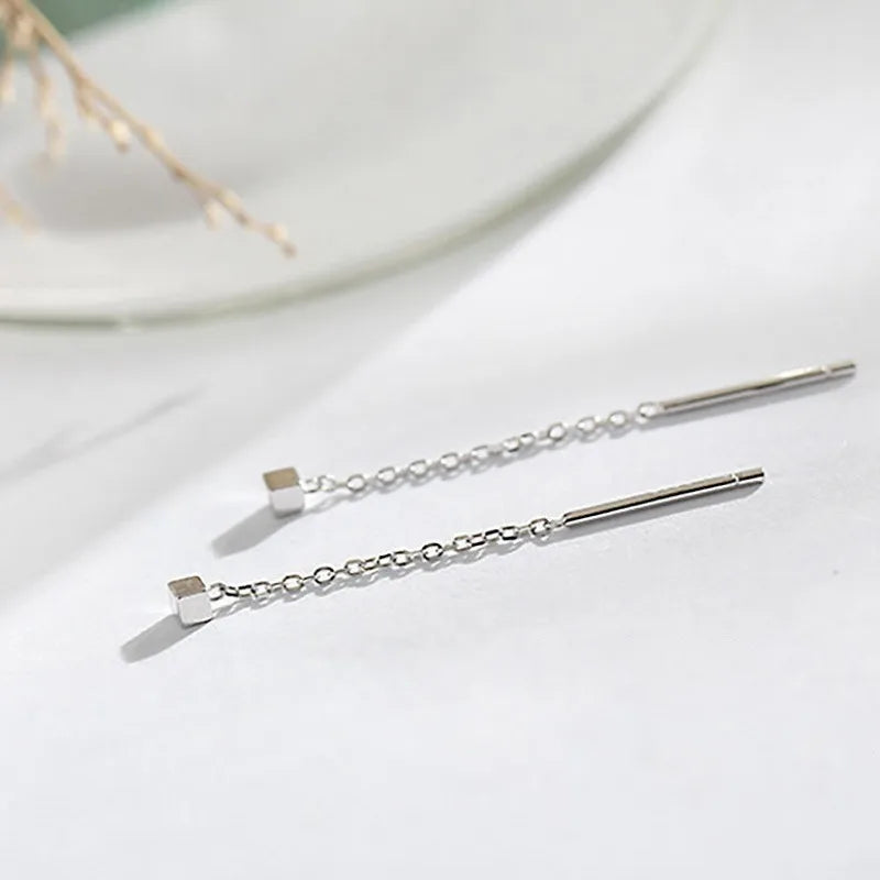 Kaelen – Boucles d'oreilles en cube et élégantes franges