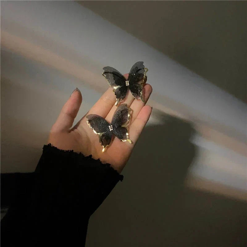 Jean – Boucles d'oreilles papillon en tressage léger