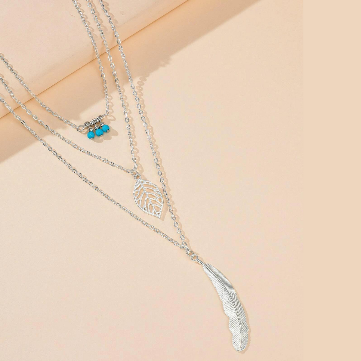 Pendentif en feuille et plume - Collier à 3 couches