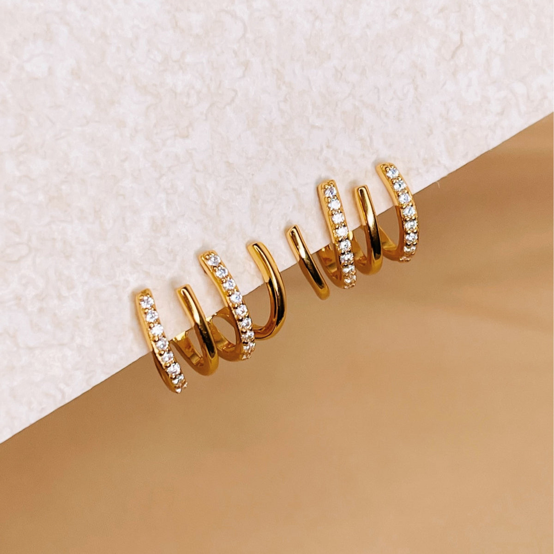 Boucles d'oreilles Huggie à quatre pointes