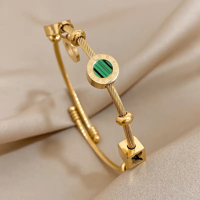 Rhian – Bracelet doré de signature