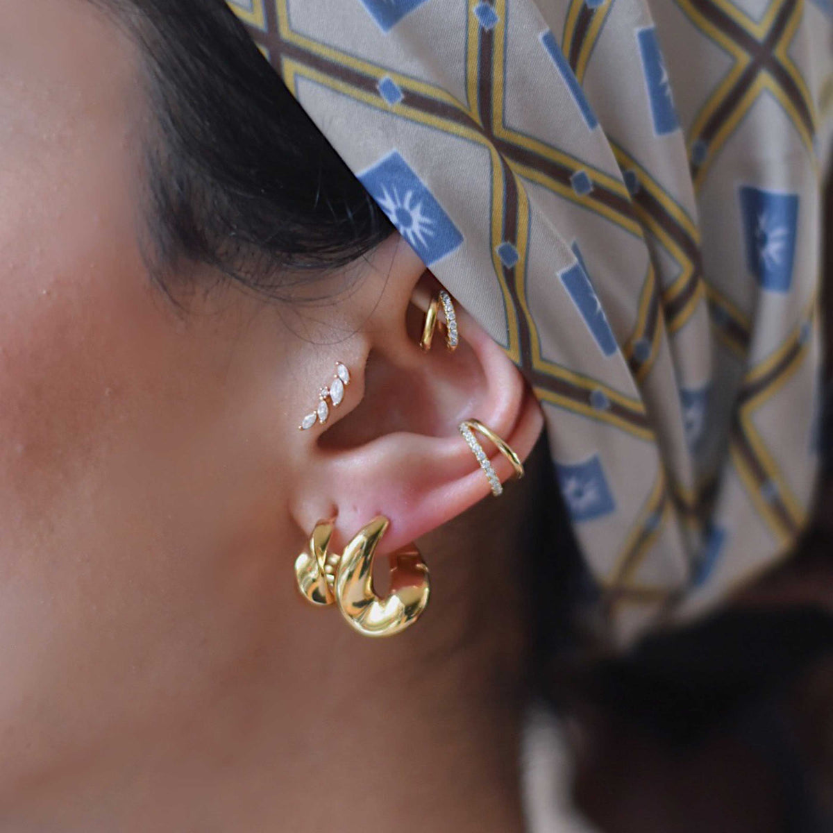 Kelly – Manchon d'oreille doré