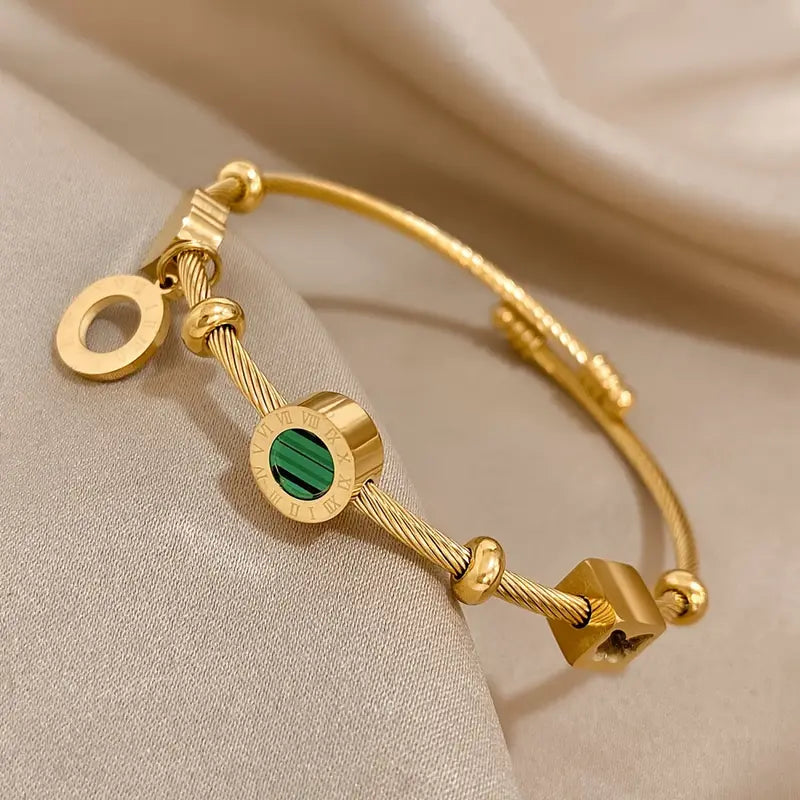 Rhian – Bracelet doré de signature