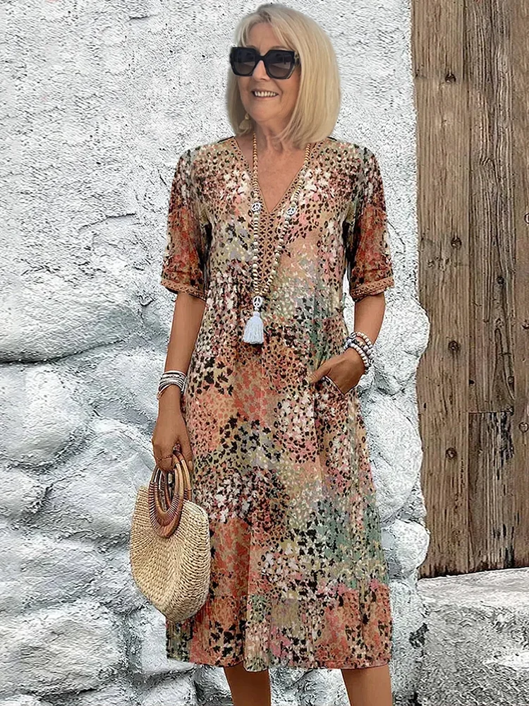 Harper – Robe mi-longue élégante avec imprimé floral