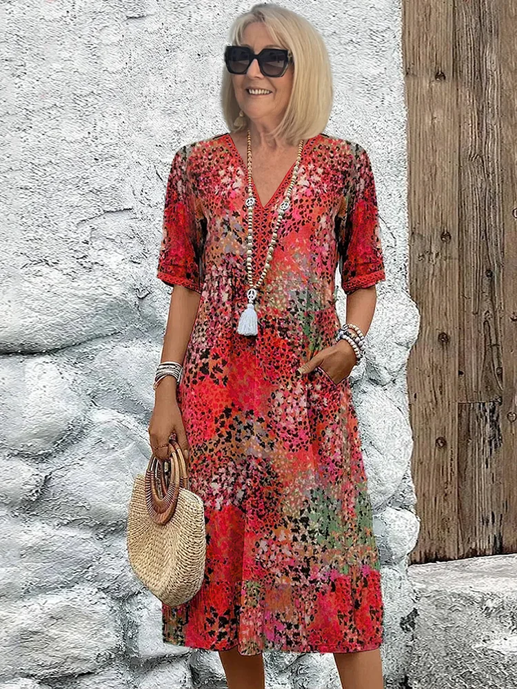 Harper – Robe mi-longue élégante avec imprimé floral