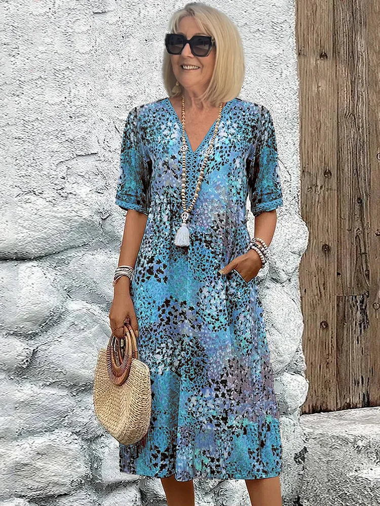 Harper – Robe mi-longue élégante avec imprimé floral