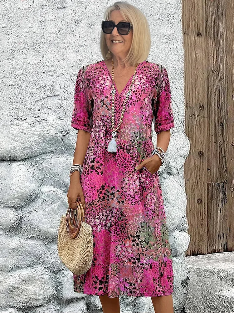 Harper – Robe mi-longue élégante avec imprimé floral