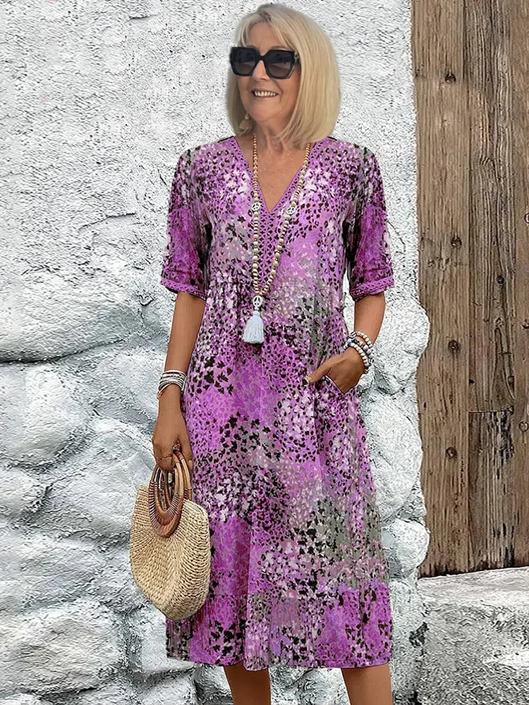 Harper – Robe mi-longue élégante avec imprimé floral