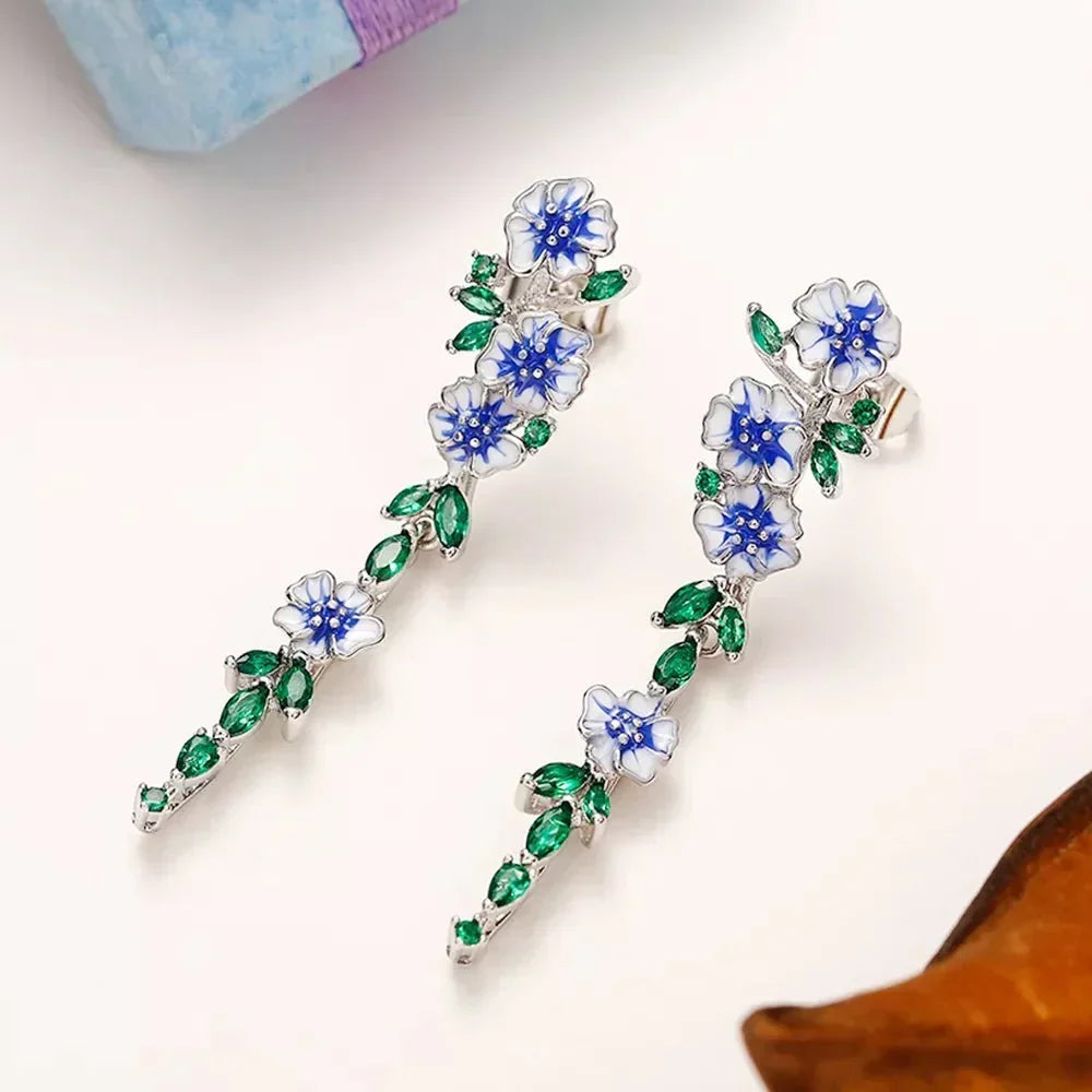Yara – Boucles d'oreilles pendantes de fleurs bleues
