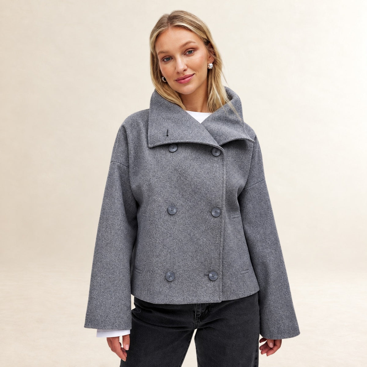 Blazer femme à double boutonnage avec revers larges et coupe droite