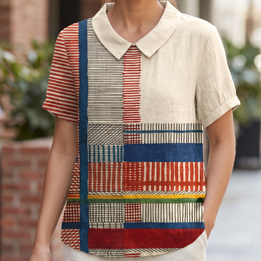 Blouse femme à col chemise, manches courtes, broderie florale, coupe droite décontractée, longueur hanches, ourlet arrondi