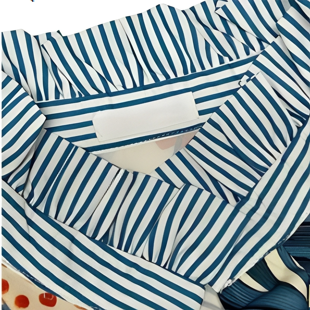 Blouse femme à demi-boutonnage, manches longues, col chemise et poignets à rayures contrastées, imprimé all-over, coupe décontractée