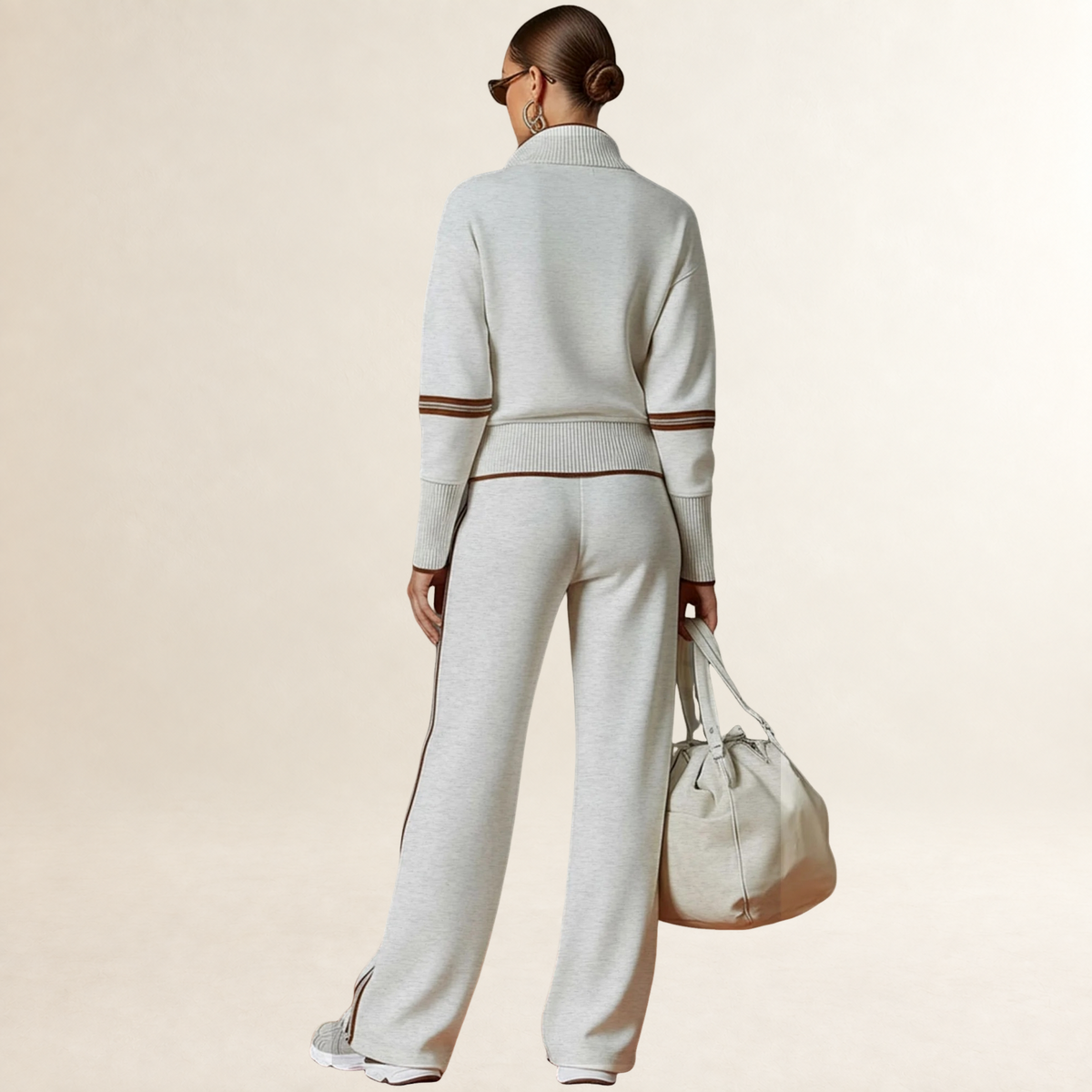 Ensemble femme sweat à demi-zip et pantalon large à rayures style sportif