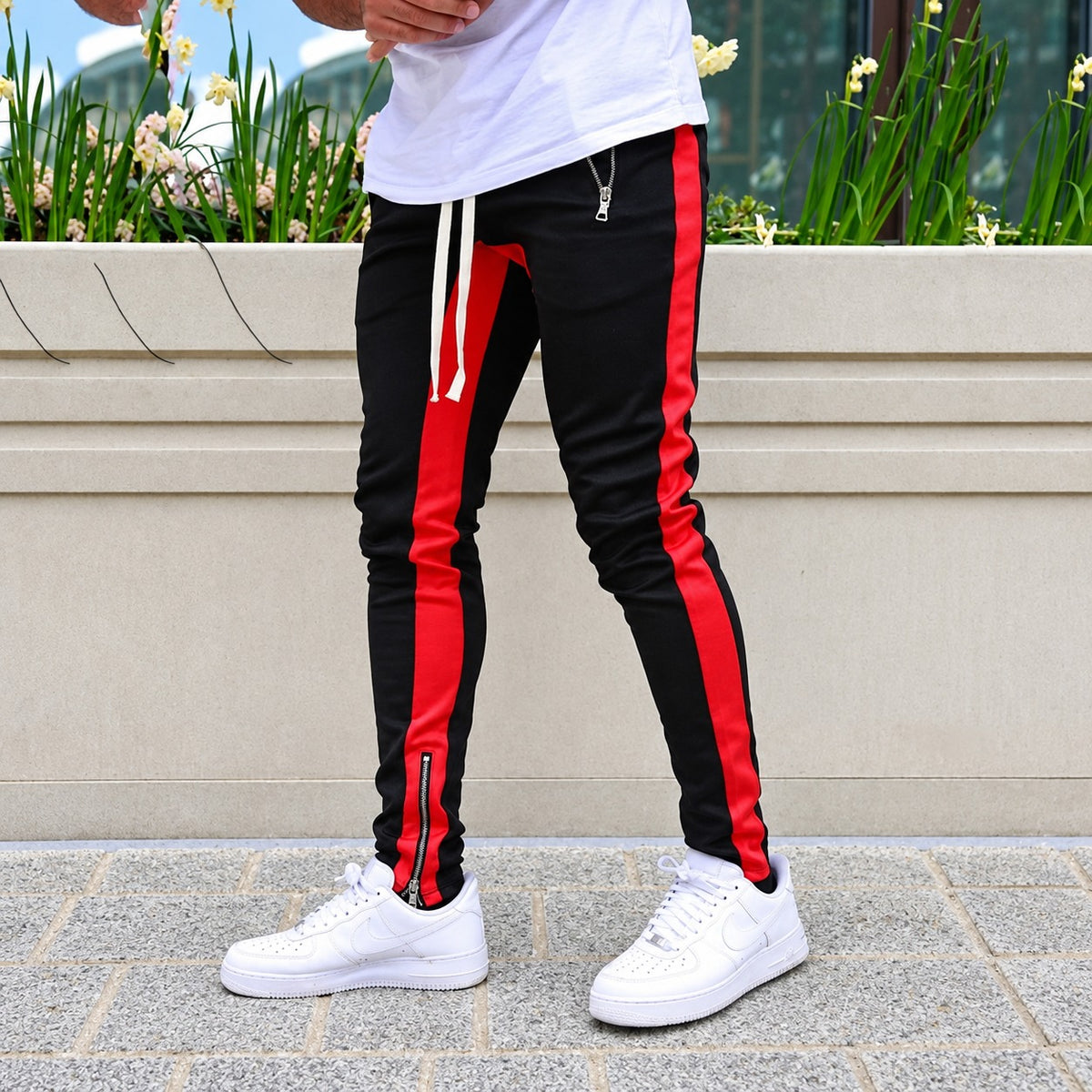 Pantalon jogging homme à rayures contrastantes et poches zippées
