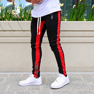 Pantalon jogging homme à rayures contrastantes et poches zippées