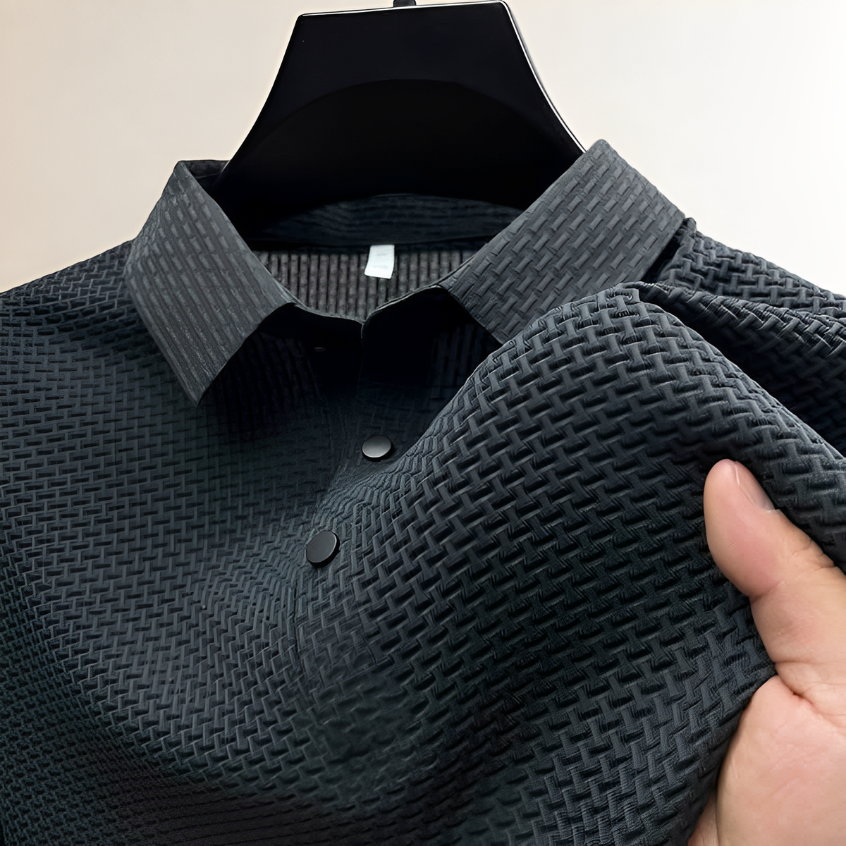 Polo homme à texture panier, col espalier, patte à pressions et coupe classique