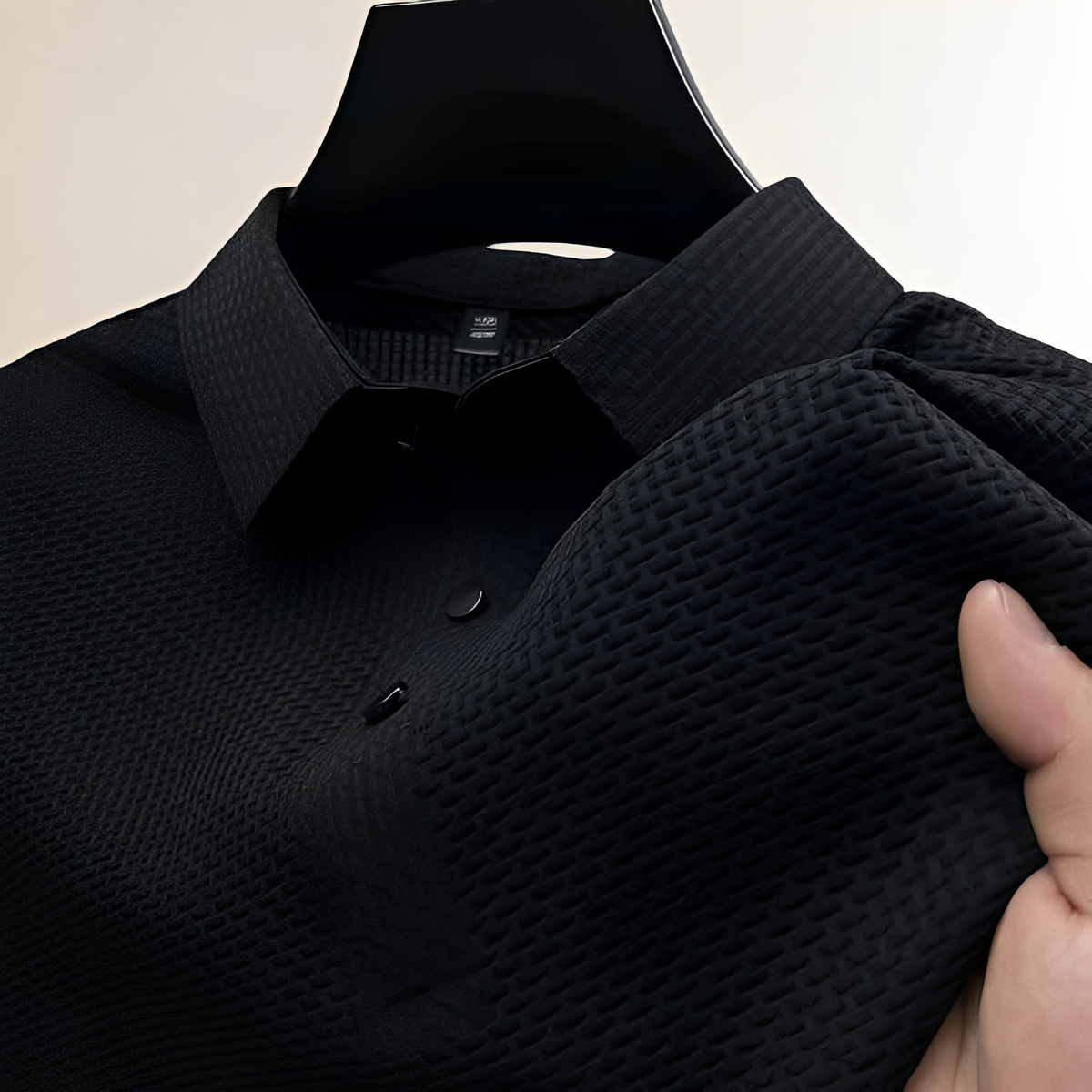 Polo homme à texture panier, col espalier, patte à pressions et coupe classique