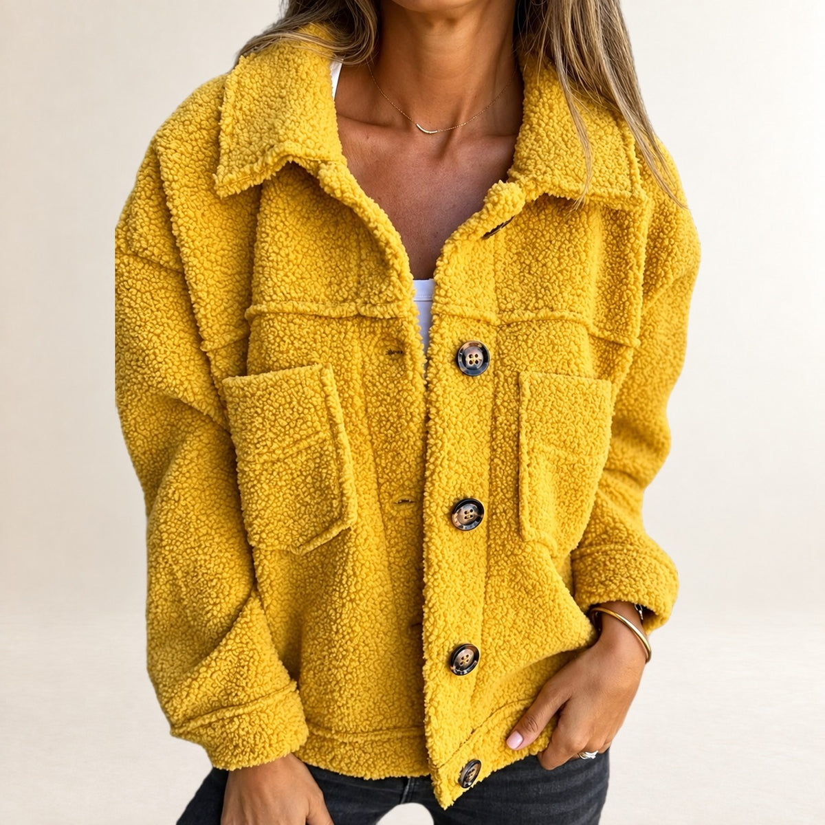 Veste courte femme à boutons frontaux, texture texturée, col en revers et poches plaquées